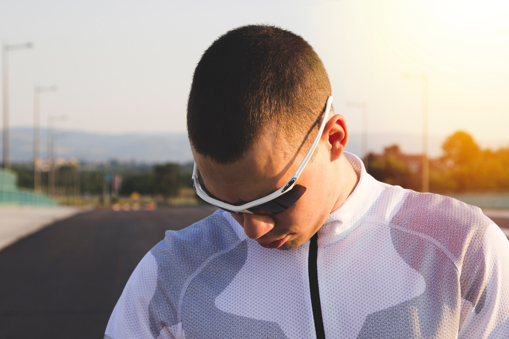 Sports man with sports sunglasses